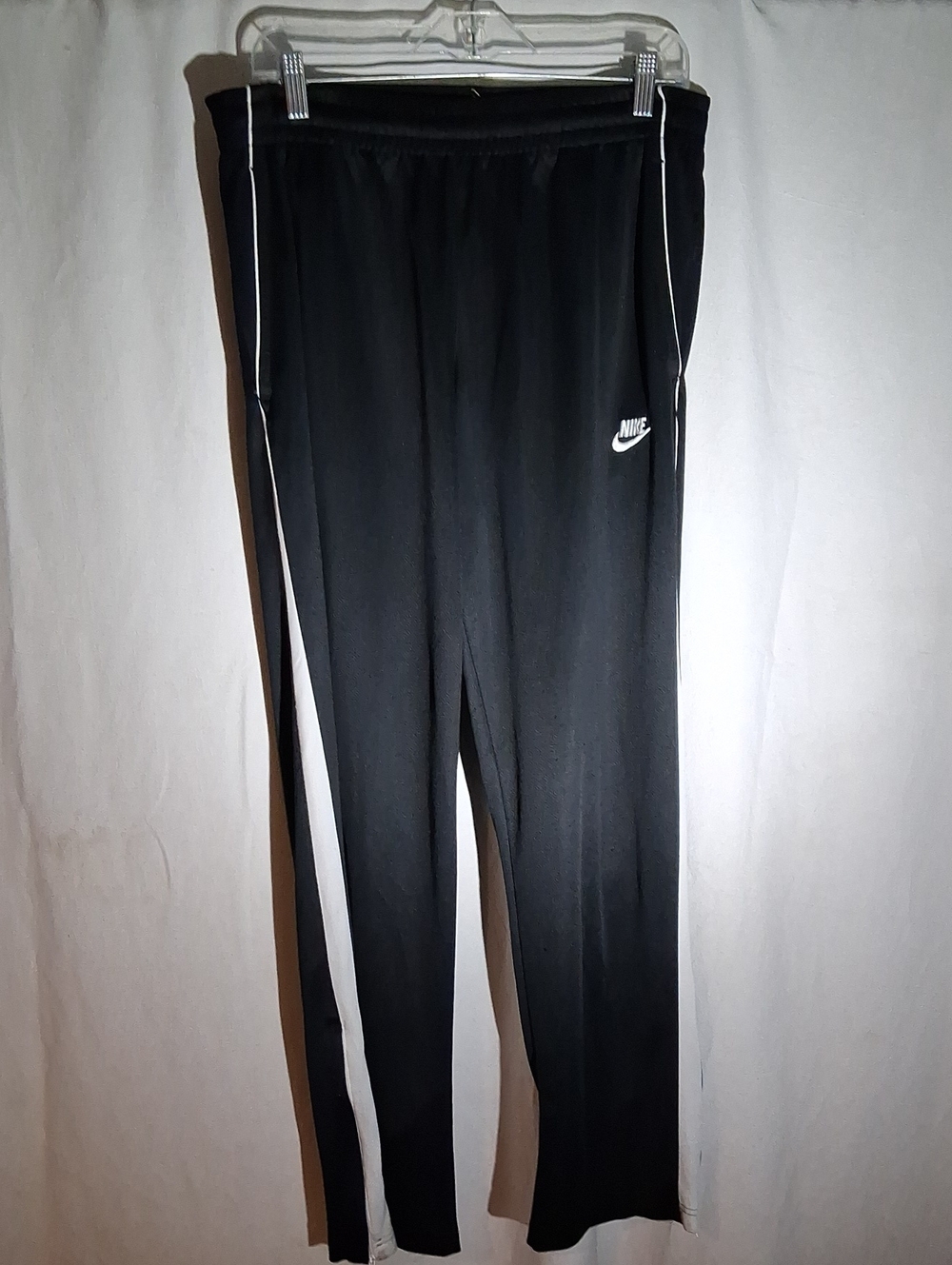 Nike Sportswear tribute Black Track Pants with White Side Stripes